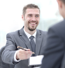 Sticker - closeup.a successful businessman, signing a lucrative contract