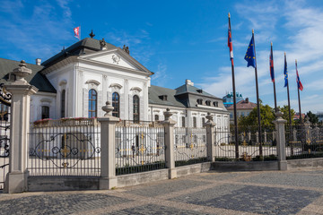 BRATISLAVA, SLOVAKIA - SEPTEMBER 13, 2018: The Grassalkovich Palace with National flags of the Slovak Republic and European Union, Bratislava, Slovakia