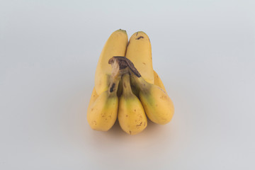 a tasty yellow banana with a white background