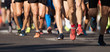 © pavel1964 - Marathon running race, people feet on city road