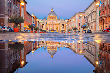 Rome, Vatican City. Cityscape image of illuminated Saint Peter`s Basilica and Street Via della Conciliazione, Vatican City, Rome, Italy.