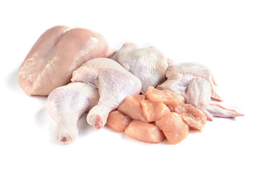 Wall Mural - Raw chicken breast, fillets, legs, thighs and wings isolated on white background. Chicken meat with different parts of chicken carcass separated and chopped.