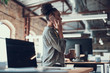 © Yakobchuk Olena - Beautiful afro american girl talking on cellphone at work