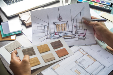 architect designer interior creative working hand drawing sketch plan blue print selection material 