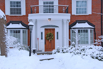 Wall Mural - snow covered front yard of brick house