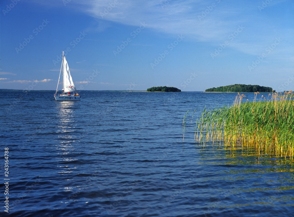 Sniardwy Lake, Masuria region (Mazury), Poland - July, 2005: sailboat on Sniardwy lake - obrazy, fototapety, plakaty 