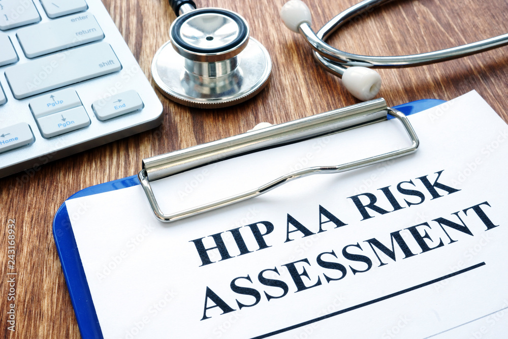 Hipaa risk assessment form and stethoscope. Stock Photo | Adobe Stock