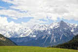 Fototapeta  - View of the majestic Zugspitze mountain from the alp meadows of Lähn, Tyrol, Austria.