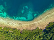 © umike_foto - Aerial top view of tropical island Bulalacao. Beautiful tropical island with white sandy beach, palm trees and green hills. Travel tropical concept. Palawan, Philippines