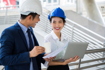 Beautiful employee present the plan to her manager with happyness