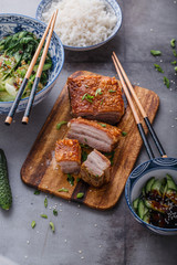 Chinese crispy skin pork belly with bok choy and cucmbers