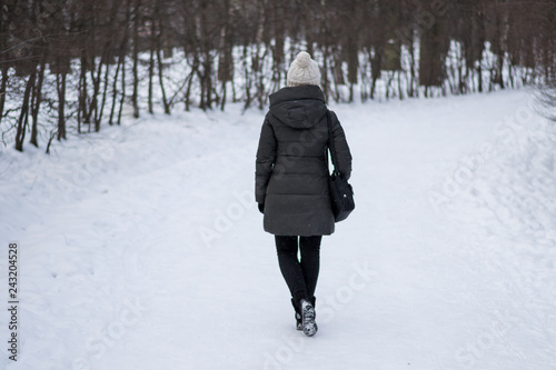 girl walking in snow