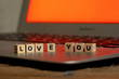 © SB Arts Media - Close up of laptop and love message in stay connected, online dating or shopping for Valentines day