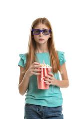 Canvas Print - Emotional teenage girl with 3D glasses and popcorn during cinema show on white background