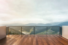 Balcony View Of  Mountains. Landscape. Sunny Day. Terrace With A Beautiful View.