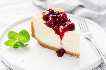 Classic Cheesecake With Cherry Sauce On White Plate. Tasty Delicious Dessert Cream Cake