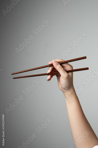 Fotografie, Obraz hand chopstick asian japanese chinese food style traditional