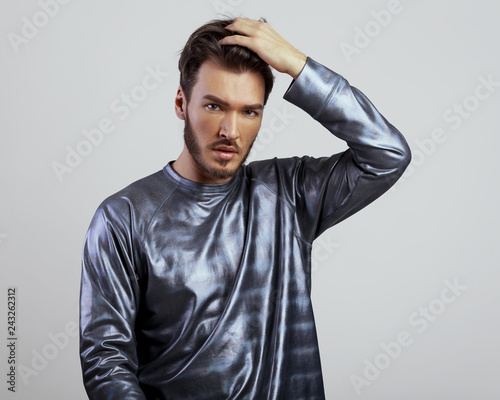 Handsome Man Holding Hand On His Head Or Straightens Hair Nice