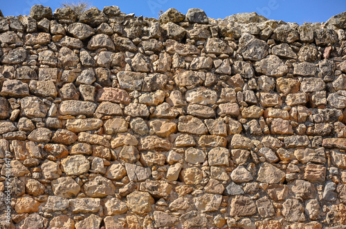 Fotografie, Obraz Muro de piedra con aparejo irregular, Consuegra, Toledo, España