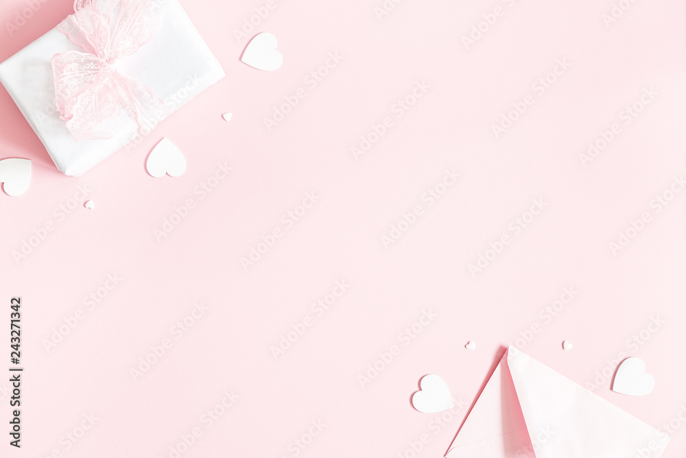 Valentine's Day background. Gift box, envelope on pastel pink background. Valentines day concept. Flat lay, top view, copy space - obrazy, fototapety, plakaty 