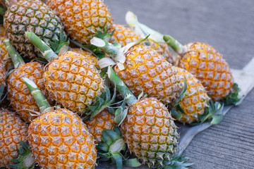 Close-up Of Fresh Pineapples for sale at local market.