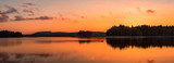 Fototapeta Zachód słońca - Golden lake sunset panorama / Panoramic view with golden lake sunset in Rhodope Mountains, Bulgaria