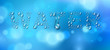 Water word designed with realistic water drops with blurred background beyond, vector illustration of ecology theme, ecosystem, environment protection.
