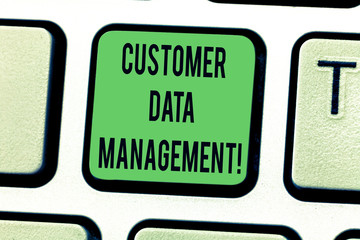 Text sign showing Customer Data Management. Conceptual photo Keep track and analysisage customers information Keyboard key Intention to create computer message pressing keypad idea