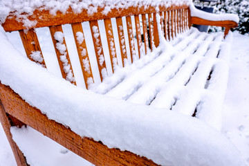 Canvas Print - wooden park bench in winter