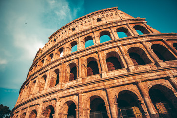 Fototapete - The ancient Colosseum in Rome at sunset