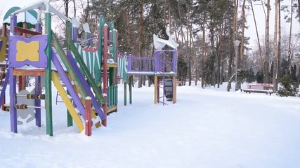 Wall Mural - View of the Playground in the winter Park of the city.