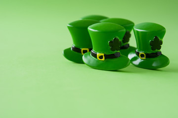 st patrick day hat on green background. copyspace