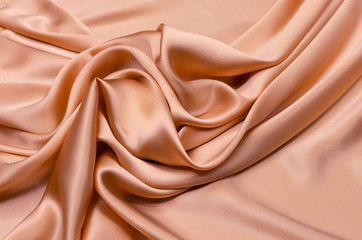 Wall Mural - Peach-colored silk fabric