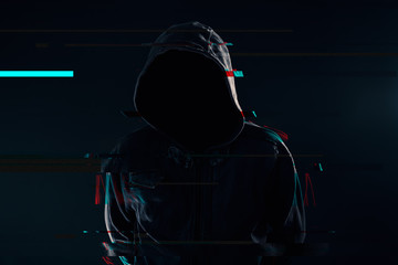 Wall Mural - Hooded computer hacker with glitch effect