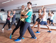 © JackF - Group of young people dancing salsa together