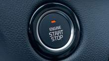 Car's ignition button is getting pushed to start and stop the vehicle