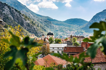 View on old town of Kotor, on roofs, mountain and church UNESCO, Montenegro, Europe