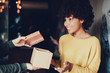 © Yakobchuk Olena - Attractive woman taking gift present from her man