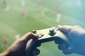 Canvas Print - Video gaming console. Man playing soccer game