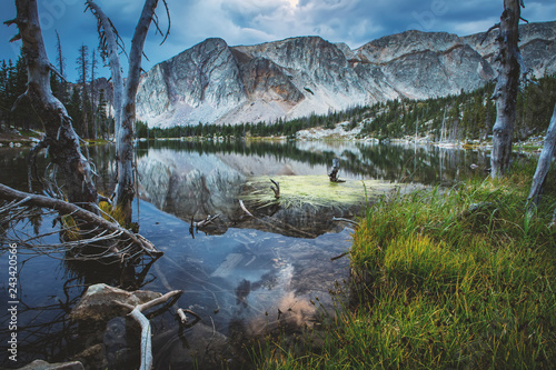 Fotografie, Obraz Summer Mirror Lake in the Snowy Range Mountains
