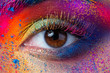 © Liudmila Dutko - Close up view of female eye with bright multicolored fashion makeup. Holi indian color festival inspired. Studio macro shot