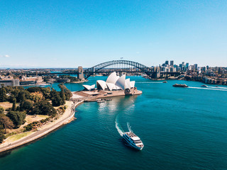 Fototapete - January 10, 2019. Sydney, Australia. Landscape aerial view of Sydney Opera house near Sydney business center around the harbour. 