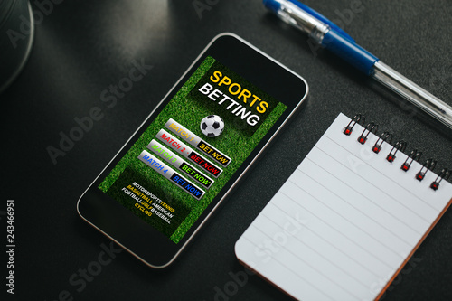 Cuadros en Lienzo Sports betting app in a mobile phone screen.