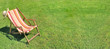 deckchair on greenery grass in a garden in panoramic size 