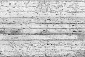 Wall Mural - Gray, dirty, rough concrete wall with traces of wooden formwork.