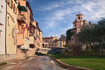 Wall Mural - Modigliana, Forli-Cesena, Emilia-Romagna, Italy: the old town with the canal and the ancient houses