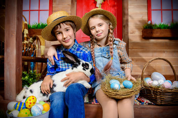 happy children are posing on porch