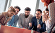 © ivanko80 - Coworkers playing table football on break