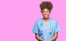 Young African American Doctor Woman Over Isolated Background Smiling With Hands Palms Together Receiving Or Giving Gesture. Hold And Protection
