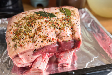 Wall Mural - closeup view raw beef cross rib chunk on oven tray with foil